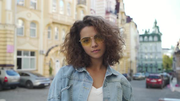 Stylish Teen Model Posing on Town Streets After Quarantine alt