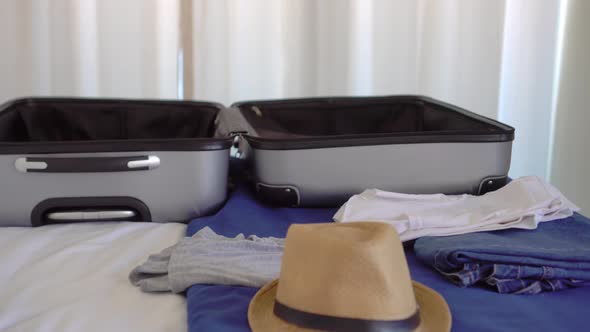 girl writes message or books accommodation using smartphone in Santa hat. alt