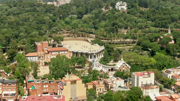 Landmark buildings of Barcelona with people walking and enjoy sunny day, aerial view alt