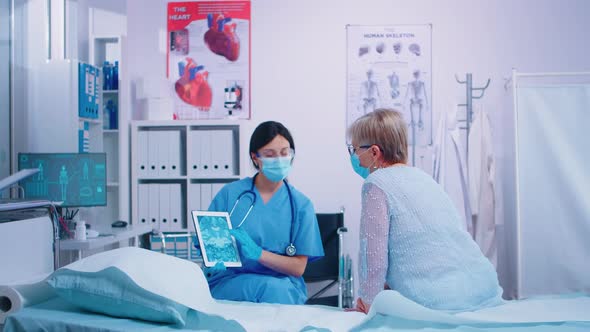 Nurse Talking with Senior Woman alt