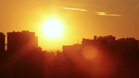 Sunset over a city time lapse