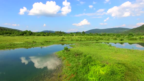 Aerial view of Jesenica river and surrounding in Croatian region Lika. alt