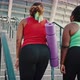 Two Overweight African American Women in Sport Clothes Going Upstairs to Stadium Carrying Fitness - VideoHive Item for Sale