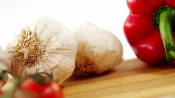 Red bell pepper, garlic and cherry tomatoes alt