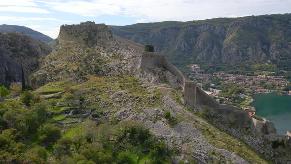 Aerial Shot of the Fortress St John San Giovanni Over the Old Town of Kotor the Famous Tourist Spot alt