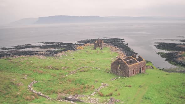 Ruins on Rathlin Island, Antrim Coast, Northern Ireland. Aerial drone view alt