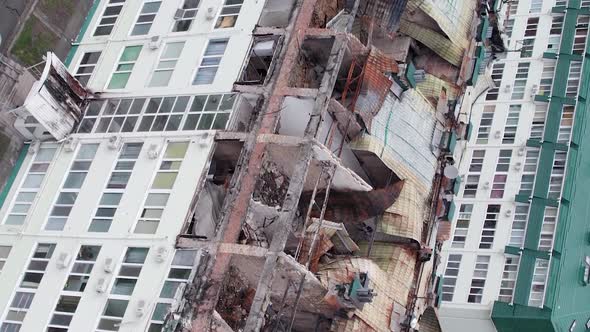 Vertical Video of a Wartorn Building in Ukraine alt