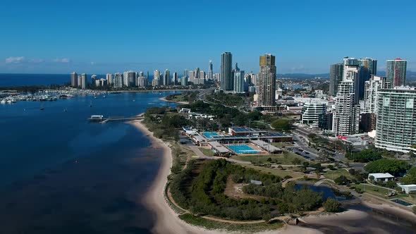 Aerial view showing Australia's Gold Coast waterways and urban sprawl on a clear day alt