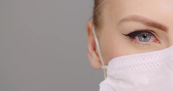 Macro Shot of Blue Eye Opening Human Iris. Womans Eye. alt