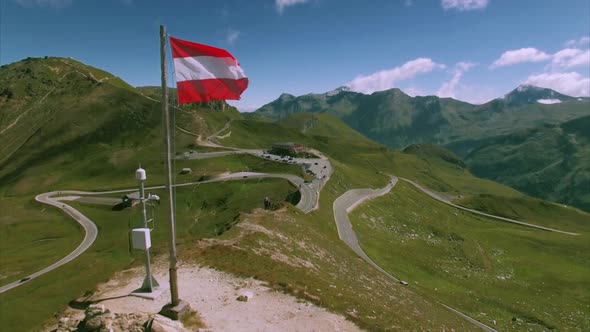 Austrian flag on the top of Grossglockner mountain pass
