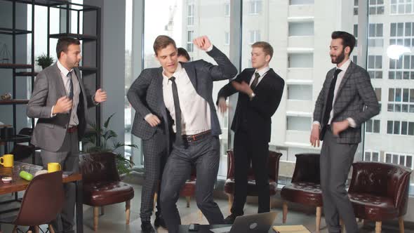 Young Business Leaders Clapping Hands To Each Other alt