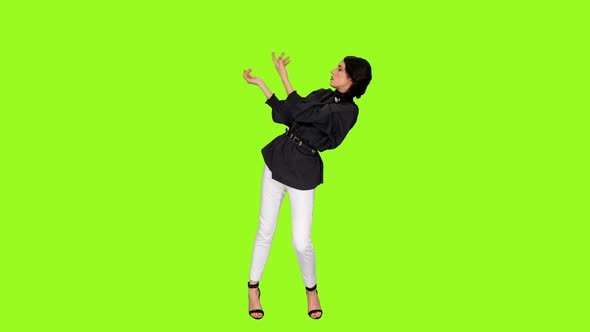 Young Charming Brunette Female Dancing Sensually on Green Screen