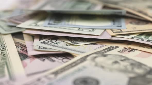 Dollar banknotes moving close-up alt