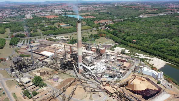 Toxic gas smoke from paper industrial factory. Air pollution. alt