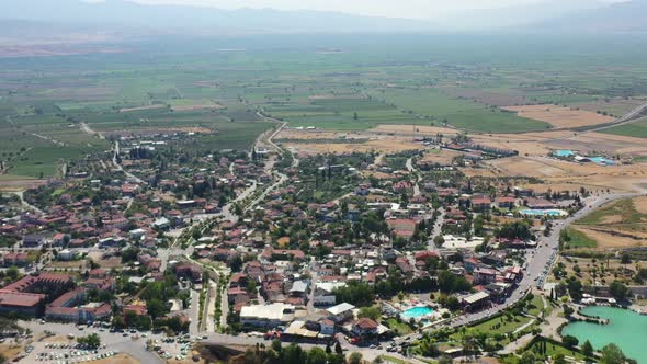high altitude aerial view of Pamukkale town in Turkey on a sunny summer day alt
