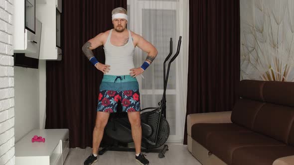 Funny Fat Sportsman Man Making Sport Fitness Exercise Showing Cardio Exercises for Weight Loss alt