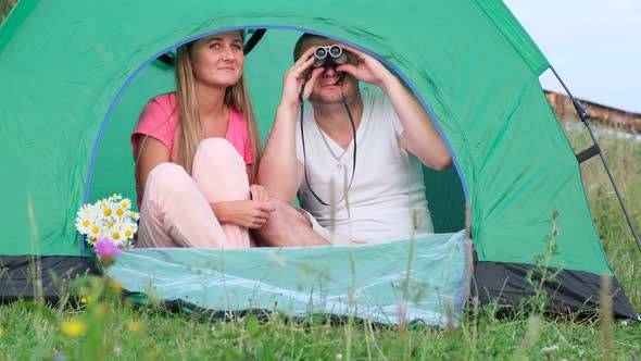 Holidays in a campsite in the Alps. The couple rested alt