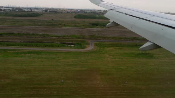 Airplane Approaching Before Landing During the Rain alt