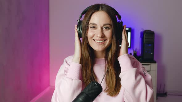 Woman Listening To The Music In Headphones alt