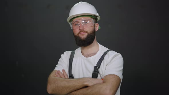 Laborer of Industrial Plant with Crossed Arms Portrait of Professional Electrician alt