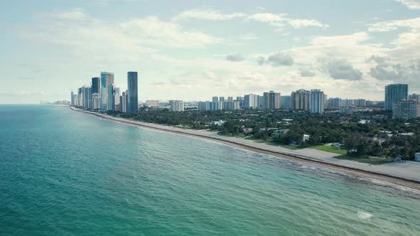  Aerial View of Clean and Warm Teal Waters of Atlantic Ocean. Front Line Buildings alt