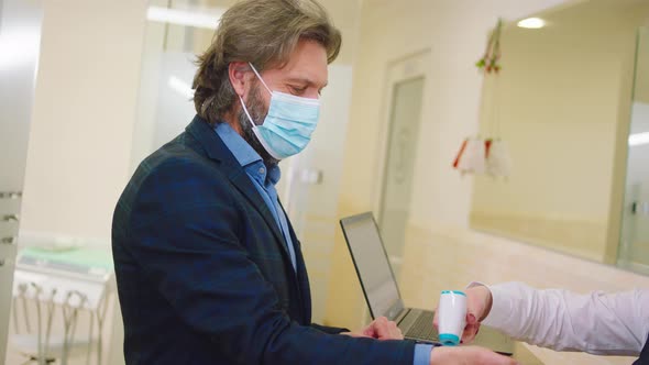 Clinic Assistant at Reception Check Up the alt