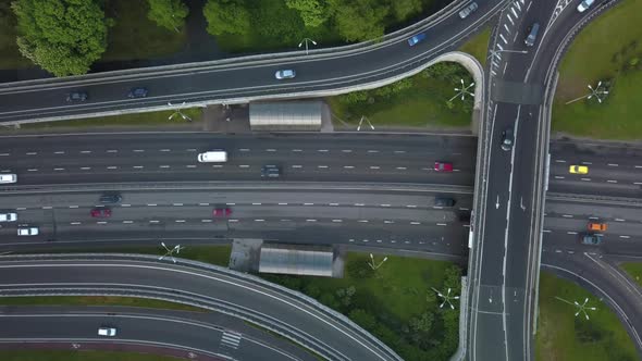 Aerial View of Loaded Cars with Traffic Jam at Rush Hour on Highway with Bridge