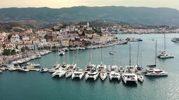 Aerial View of Poros Old Town and Marina or Seaport Greece  Drone Videography alt