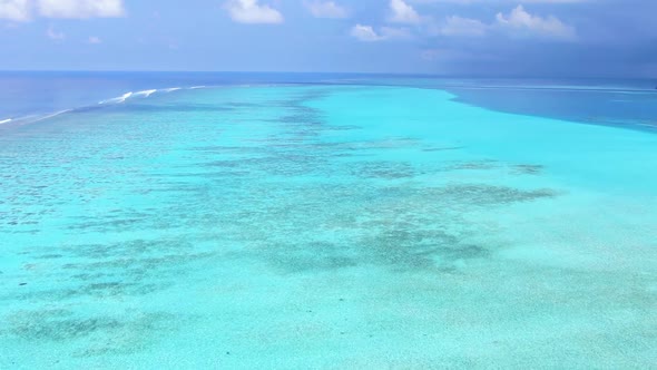 Maldive Reef with Turquoise Blue Water Aerial View