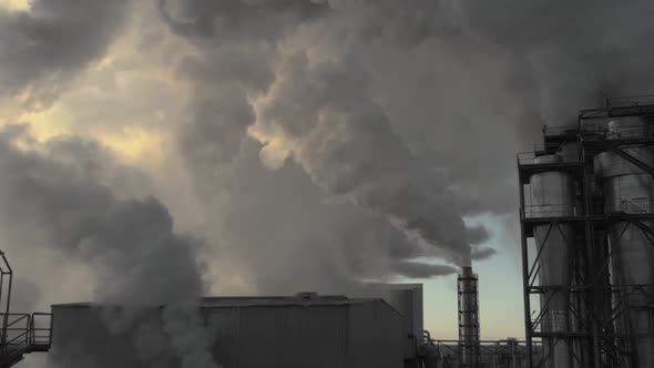 Plumes of Black Smoke are Coming Out of the Plant's Pipes