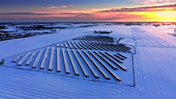 Alternative energy. Frozen photovoltaic farm in winter. alt