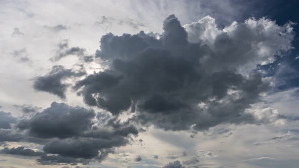 Building motions clouds. Puffy fluffy white clouds sky time lapse.