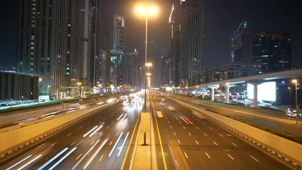 Cars Vehicles Driving on Crowded Urban City Road alt