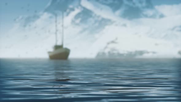 Snow Covered Mountains in Northern Ocean alt