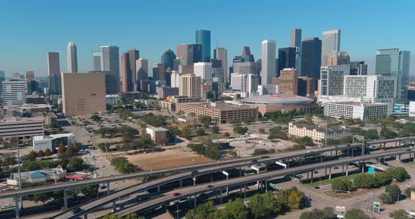 Aerial view of downtown Houston and surrounding landscape. This video was filmed in 4k for best imag alt