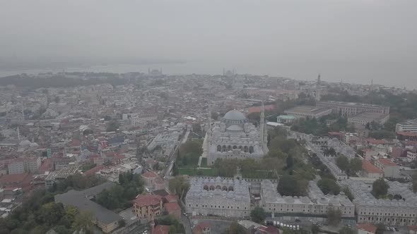 Aerial footage of Suleymaniye Mosque from a foggy day alt