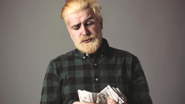 Man Counting Money. Business, Finances, Income and People Concept. Businessman Count Dollar Cash. alt