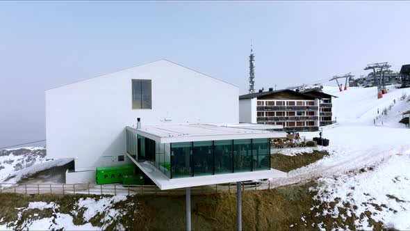 Alpine Restaurant and Museum on Snow Covered Mountain alt