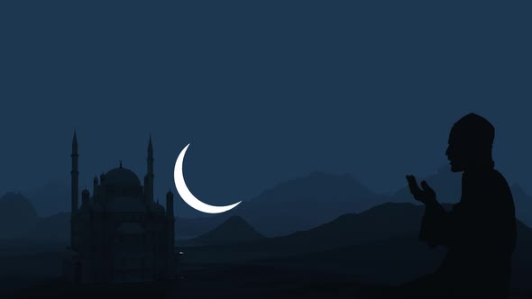 A Muslim prays against the backdrop of a mosque and the rising moon. Ramadan holiday.