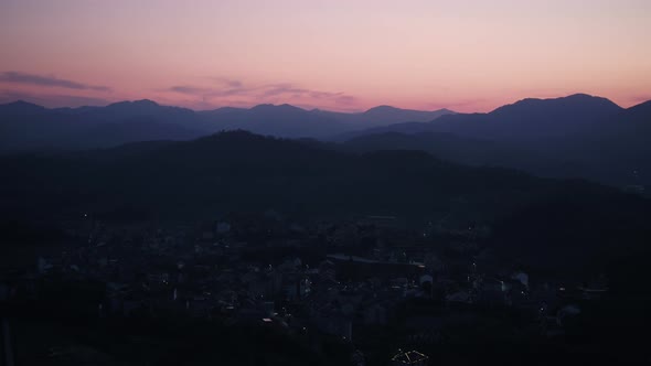 Greenhouse with Mountain village in mountain alt