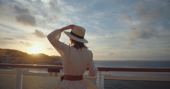Young woman looking at the city. Shot on Black Magic Cinema Camera alt