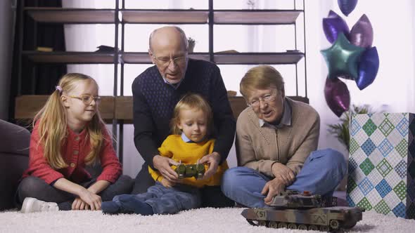 Smiling Boy Enjoying His Birthday Present alt