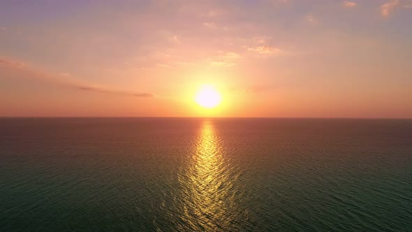 Aerial view Beautiful view sunset or sunrise over sea surface alt