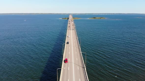 Oland Bridge in Sweden on sunny day, static drone view alt