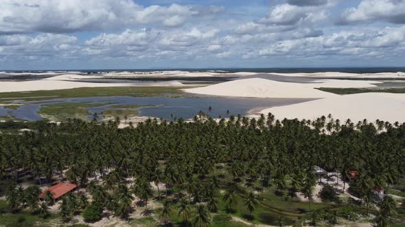 Sand dunes mountains and rain water lagoons at northeast brazilian paradise. alt