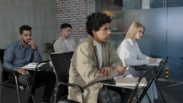 Diverse People Sit in Classroom at Desk Actively Study Science Classmates Students Listen Lecture alt