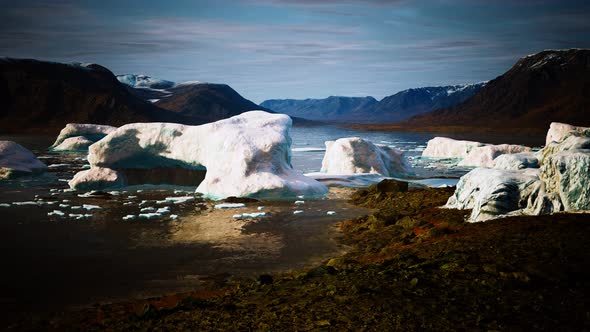 Ice Icebergs in Greenland at Summer alt