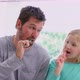 Smiling father and daughter brushing teeth 4K 4k