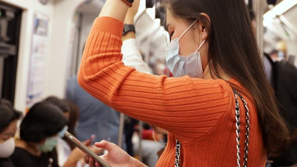 Young asian woman cover mouth , wear medical face mask to protect viruses alt