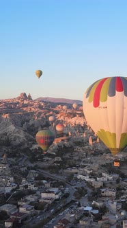 Vertical Video of Hot Air Balloons Flying in the Sky Over Cappadocia Turkey alt